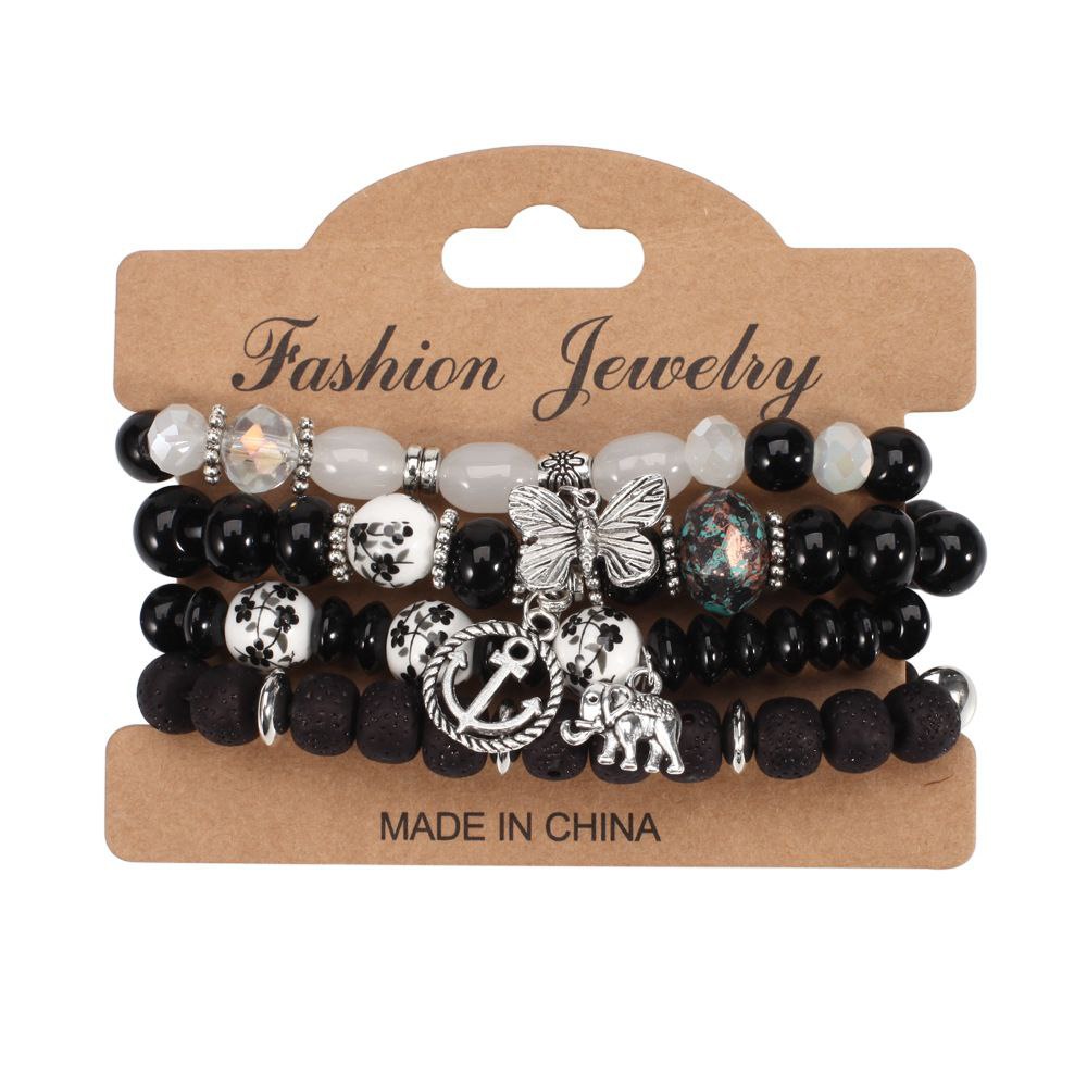 Black Beaded Bracelet With Charms